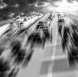 black and white blurred cars driving