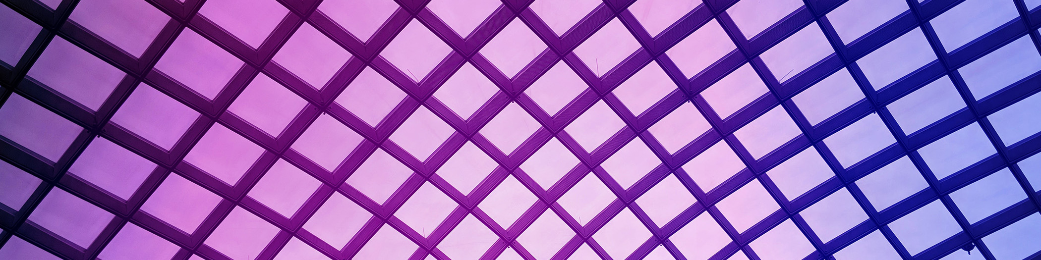 Purple background with darker grid over it.