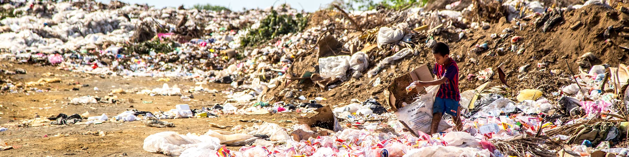 child in landfill site