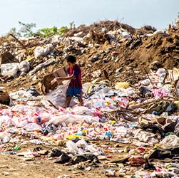 child in landfill site