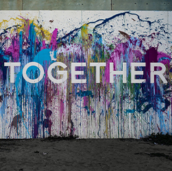 'Together' written on a wall