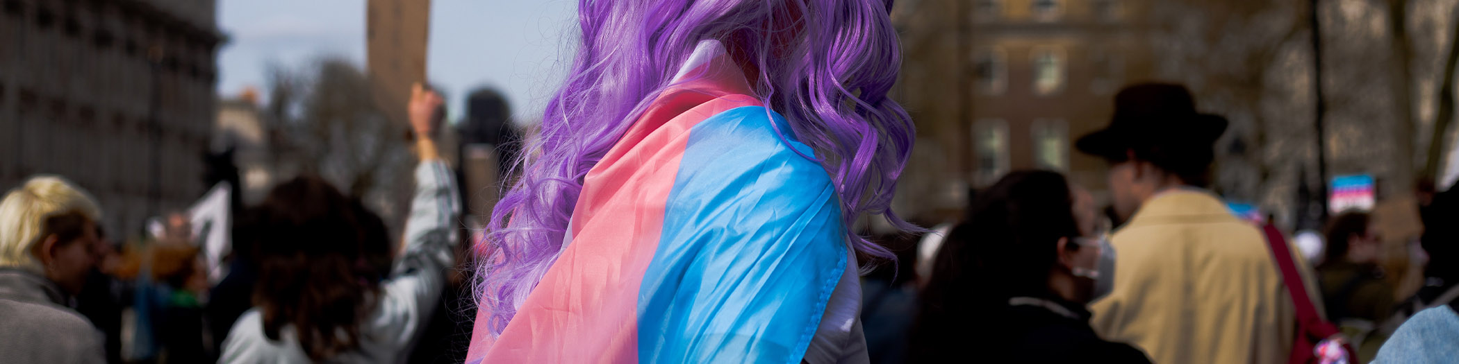 Person wearing a trans flag